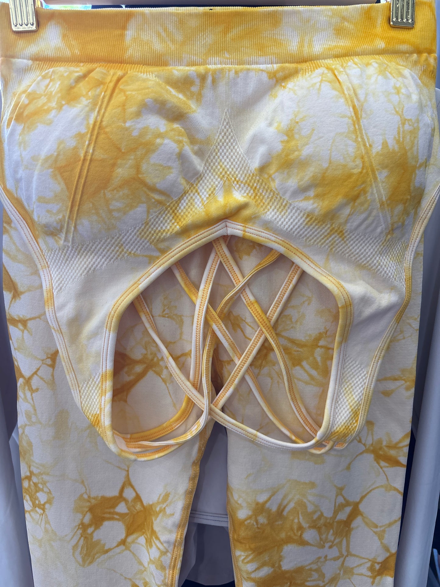 Prints: Tie Dyed Sports Bra and Leggings Set.